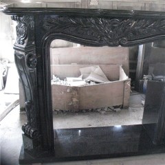 Black galaxy granite fireplace