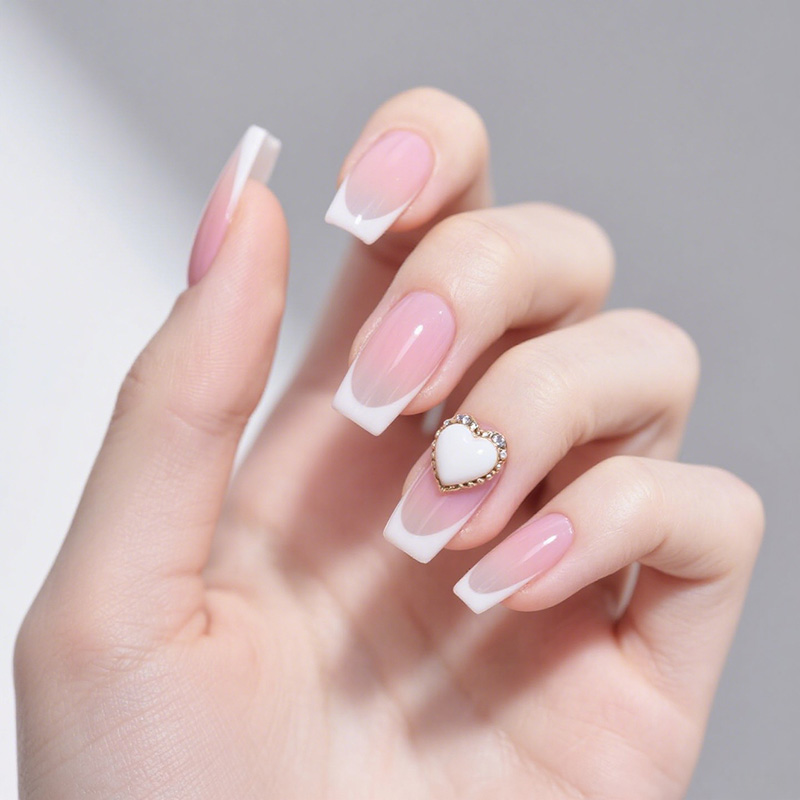 lavara press on nails French Tip Nail Art with Heart Shaped Pearl Design