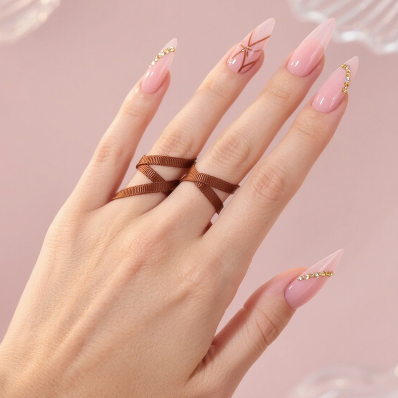 lavara press on nails nude pink long stiletto nails gold line design